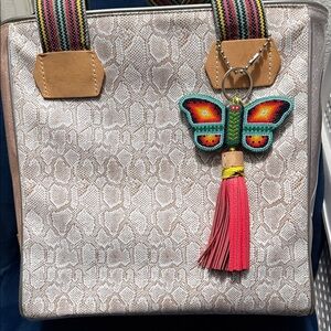 Consuela Textured Cream Tote with Colorful Butterfly Accent